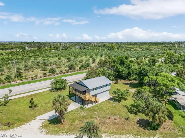 a view of a yard with an outdoor space