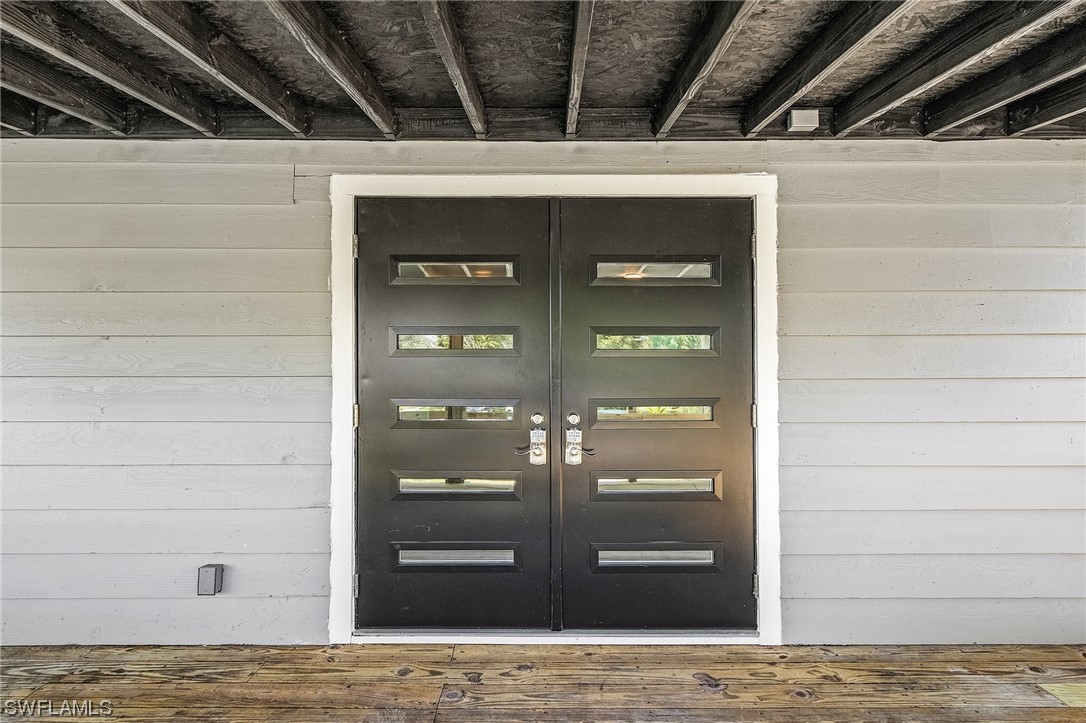 14230 Robert Road Bokeelia, FL 33922 - Photo 5 of 22 a view of a refrigerator