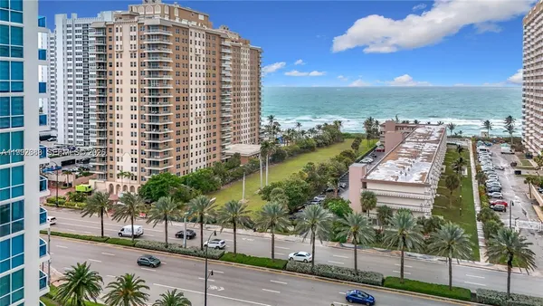 a view of a city with tall buildings