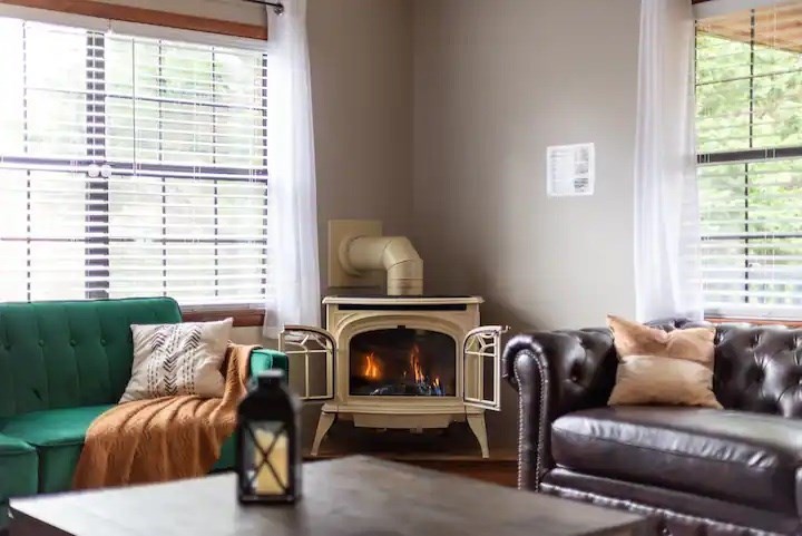3409 Line Springs Road Sevierville, TN 37862 - Photo 9 of 35 a living room with furniture and a fireplace