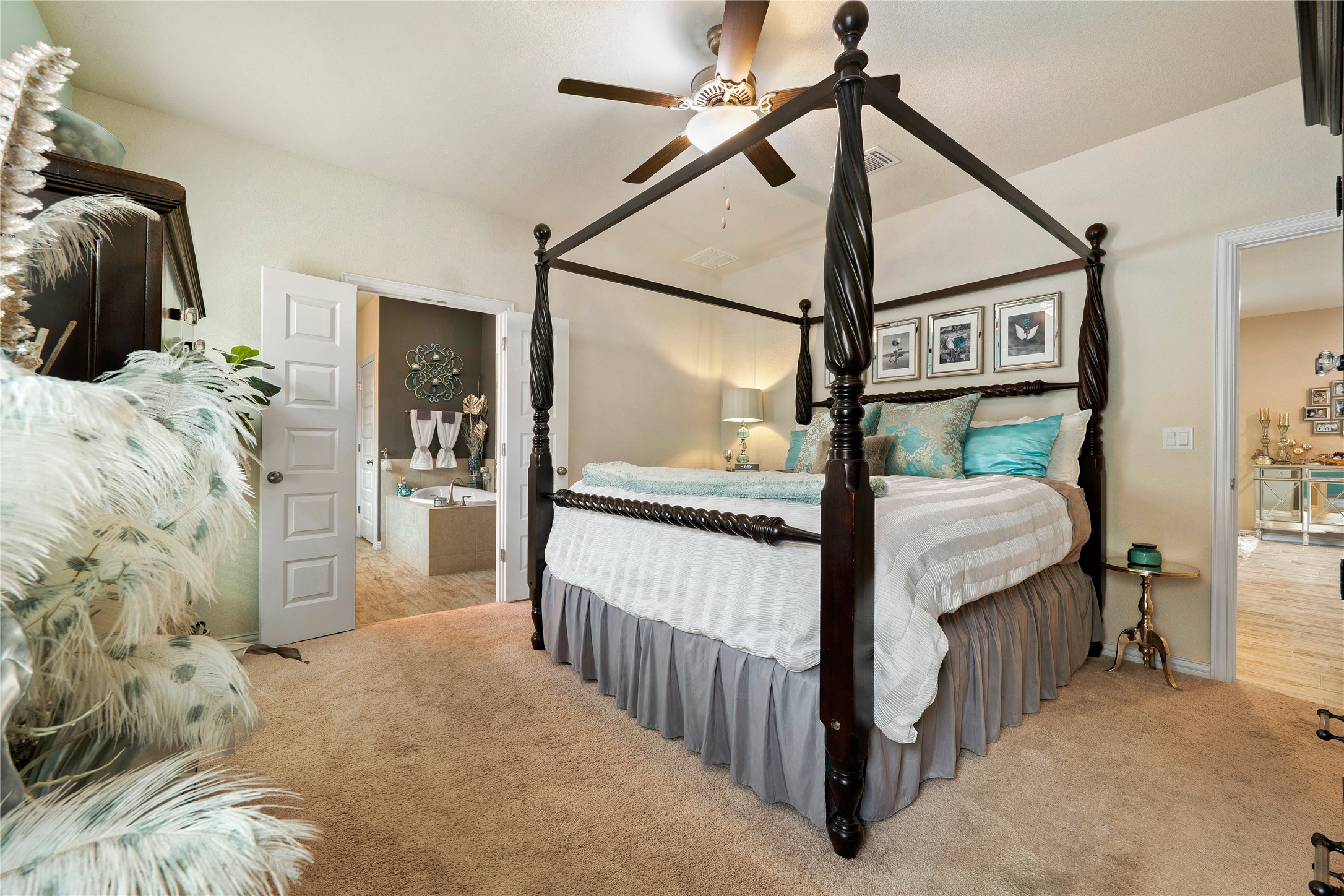 8721 Sikes Way Austin, TX 78747 - Photo 14 of 33 Primary bedroom featuring a ceiling fan, crown molding, and a tall vaulted ceiling