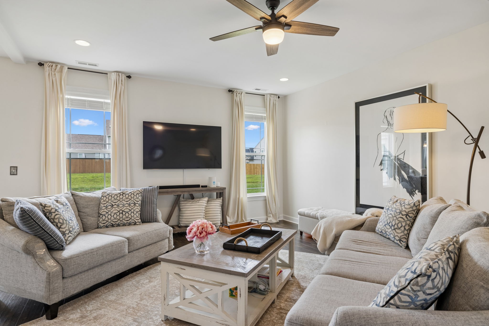 1002 Garrison Way Spring Hill, TN 37174 - Photo 12 of 63 a living room with furniture and a flat screen tv