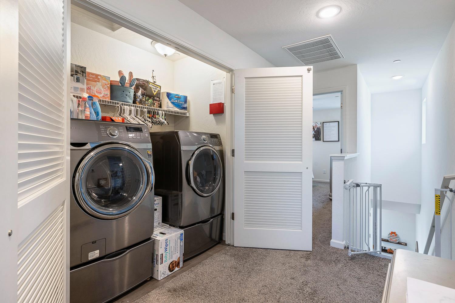 3780 Highclere Way Clovis, CA 93619 - Photo 16 of 21 a utility room with sink dryer and washer