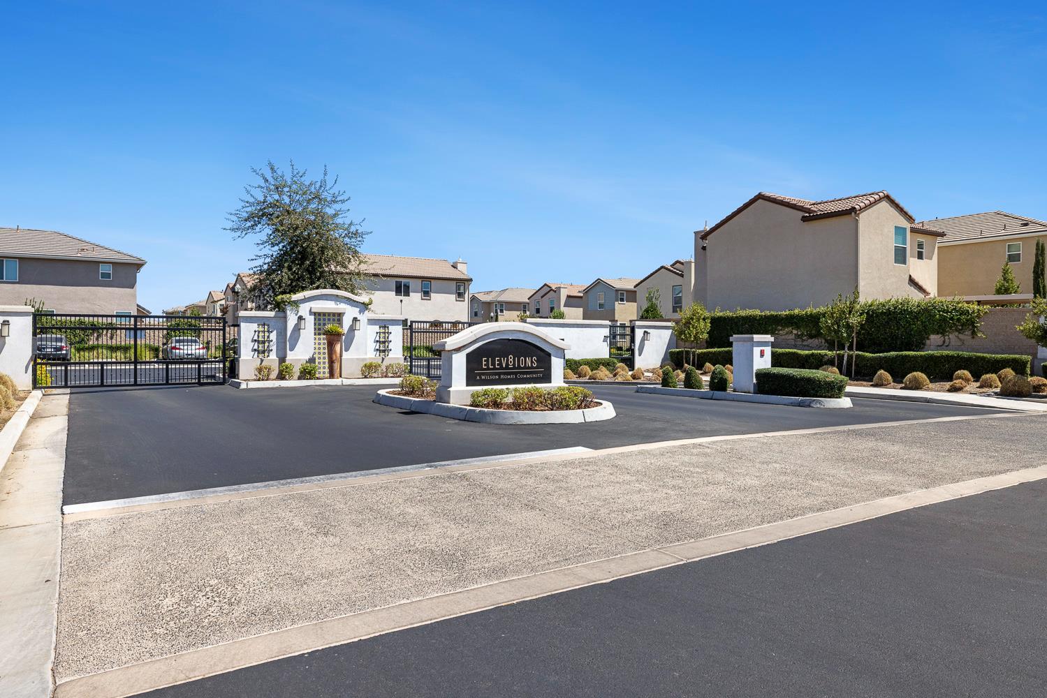 3780 Highclere Way Clovis, CA 93619 - Photo 21 of 21 a view of multiple houses with a street