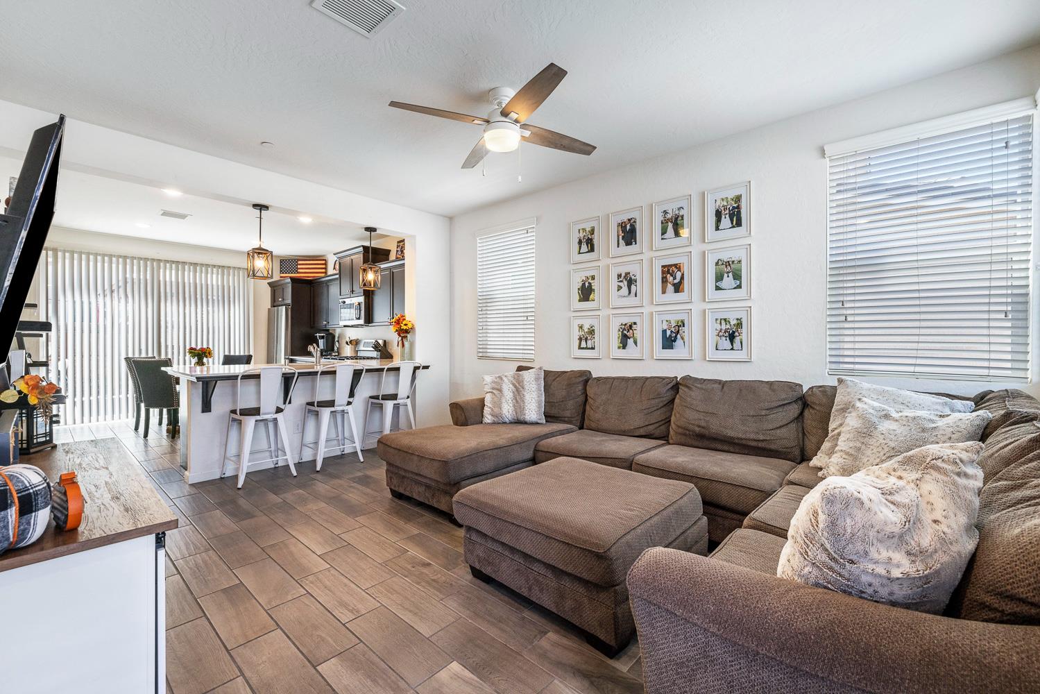 3780 Highclere Way Clovis, CA 93619 - Photo 3 of 21 a living room with furniture and a window