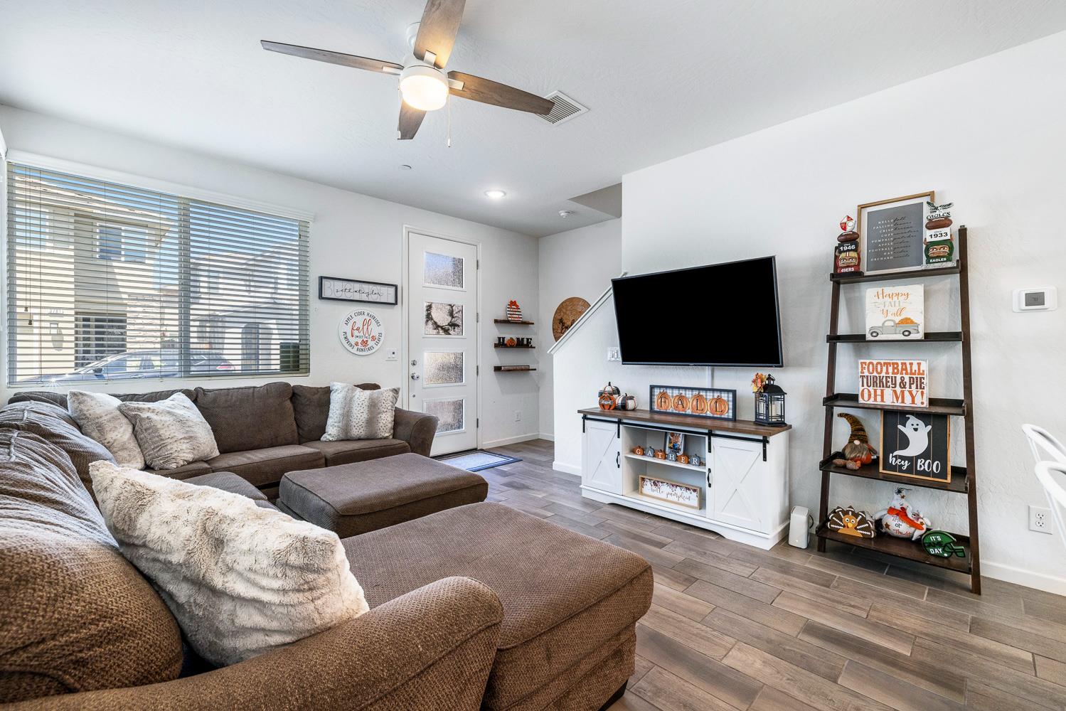 3780 Highclere Way Clovis, CA 93619 - Photo 4 of 21 a living room with furniture and a flat screen tv