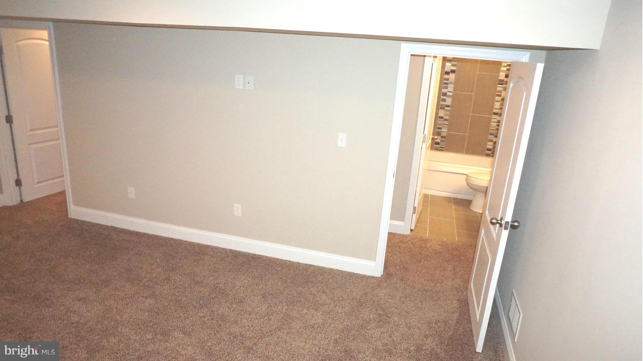 6922 Sollers Point Road Baltimore, MD 21222 - Photo 29 of 30 an empty room with windows