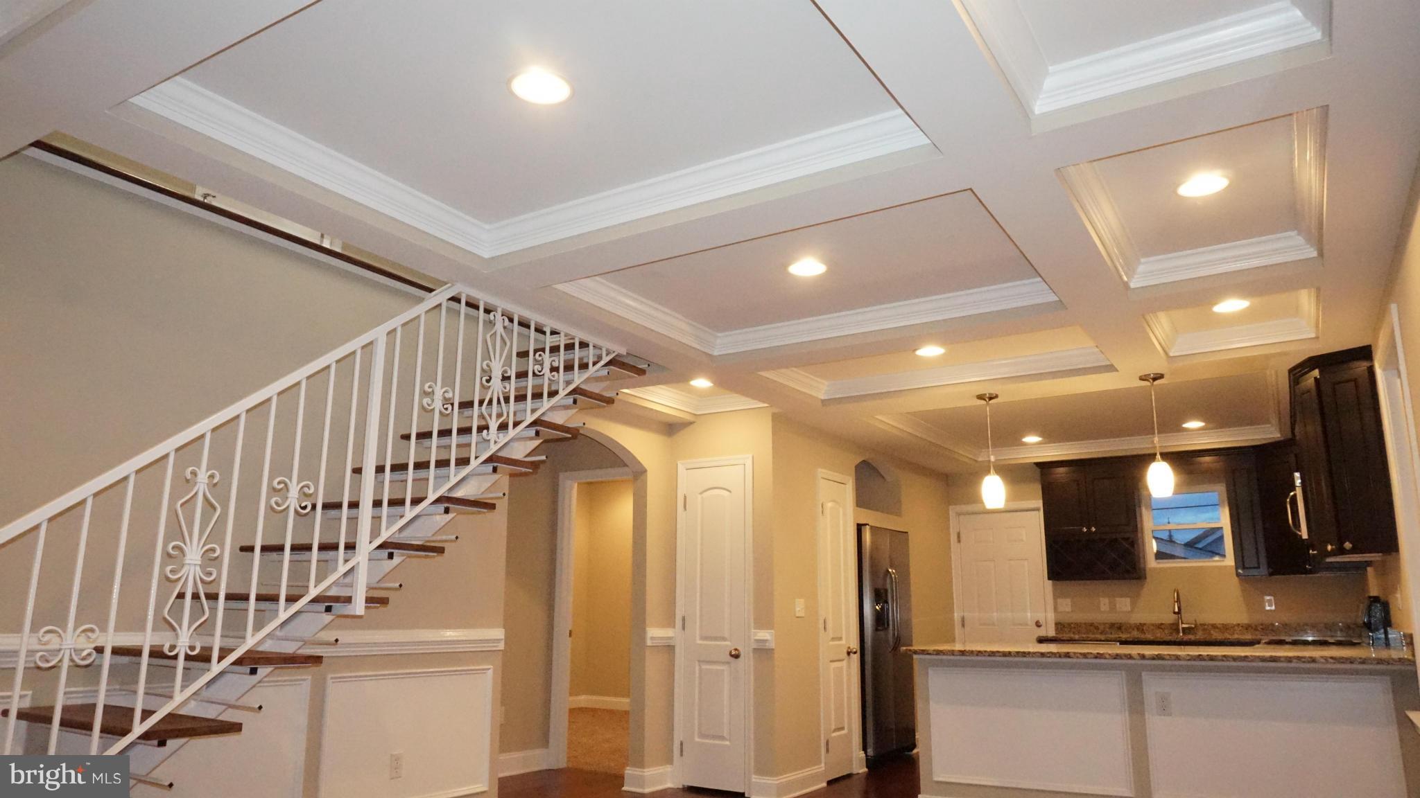 6922 Sollers Point Road Baltimore, MD 21222 - Photo 5 of 30 a view of a hallway with a kitchen