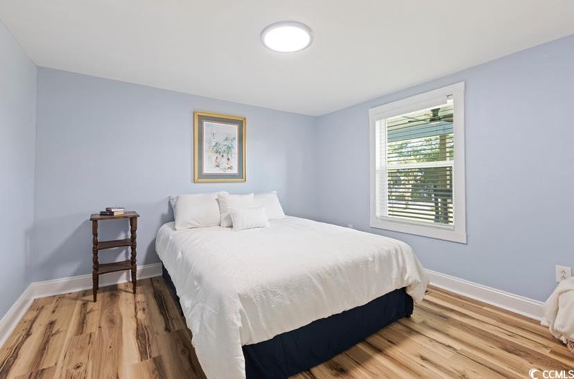 1044 Levi Street Manning, SC 29102 - Photo 12 of 26 Bedroom with light wood-type flooring and baseboards