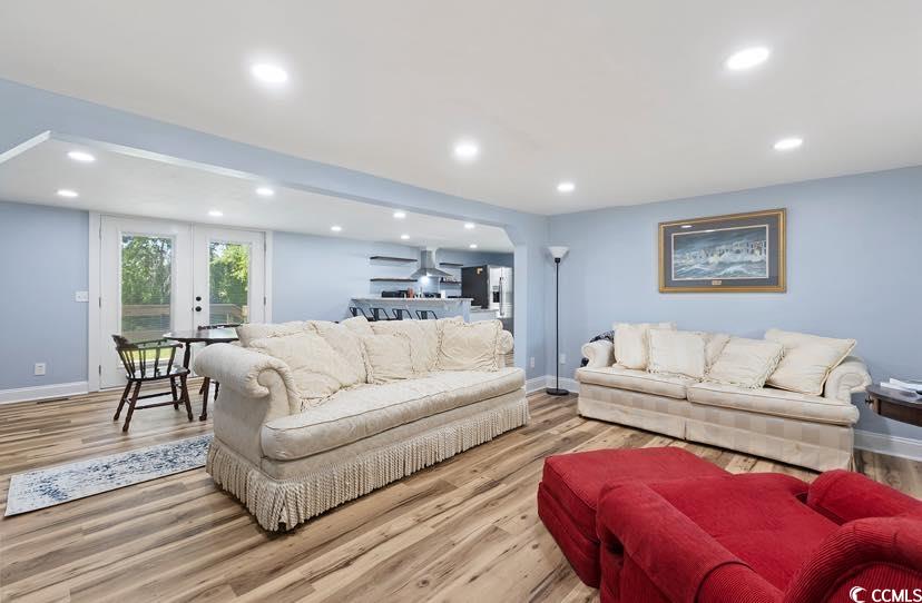 1044 Levi Street Manning, SC 29102 - Photo 4 of 26 Living room with wood finished floors, baseboards, and recessed lighting