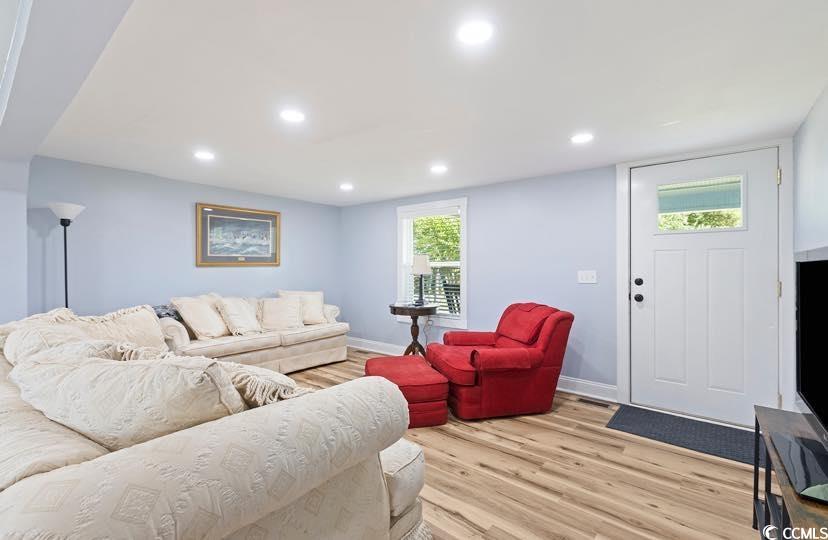 1044 Levi Street Manning, SC 29102 - Photo 5 of 26 Living area with light wood-style floors, recessed lighting, and baseboards
