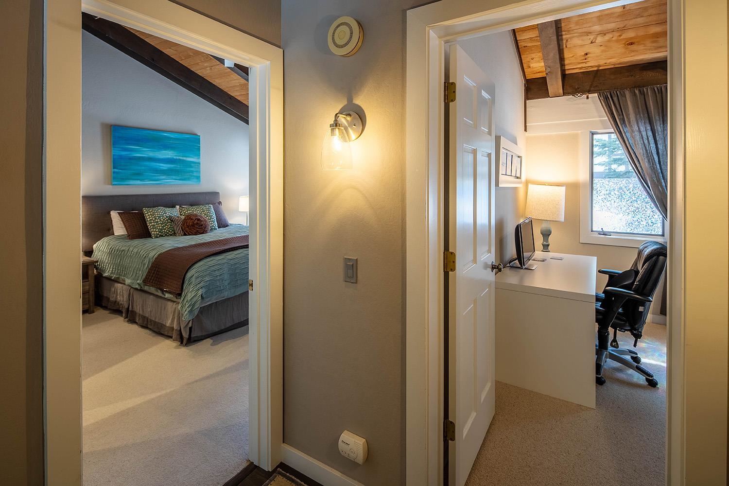 227 Olympic Vly Road, Unit 13 Olympic Valley, CA 96146 - Photo 17 of 28 a view of a bedroom from a hallway