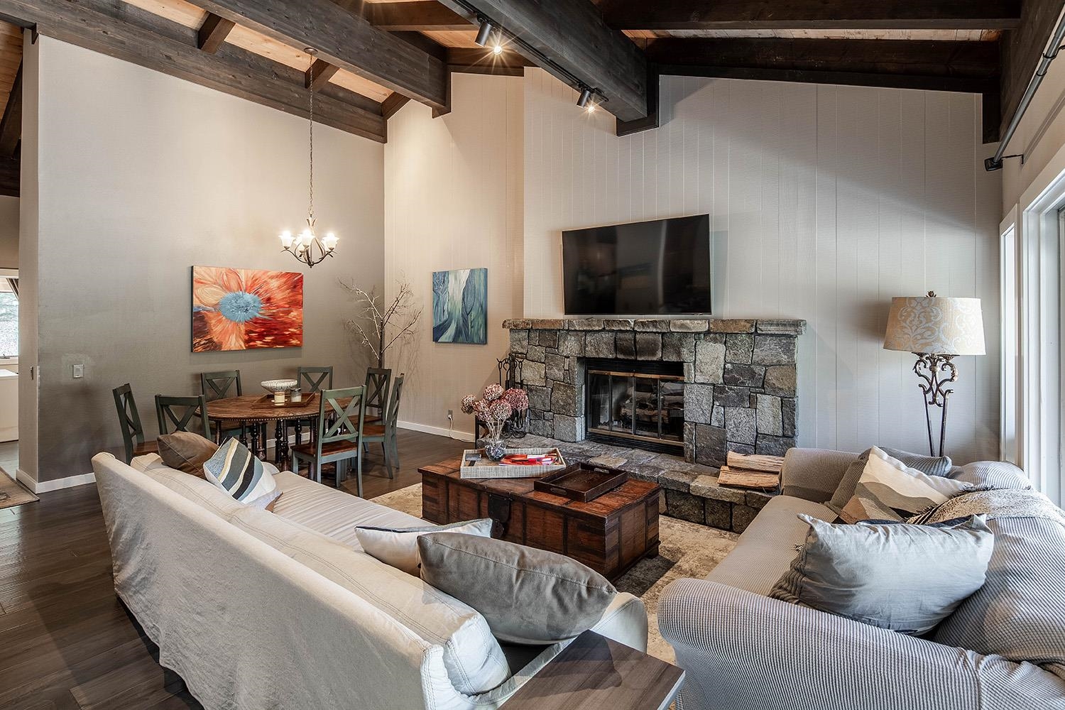 227 Olympic Vly Road, Unit 13 Olympic Valley, CA 96146 - Photo 4 of 28 a living room with furniture and a flat screen tv