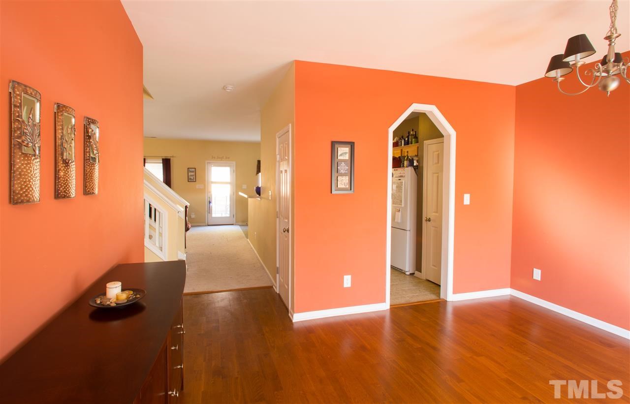 3545 Sunbright Lane Raleigh, NC 27610 - Photo 2 of 25 a view of livingroom with furniture and floor to ceiling window