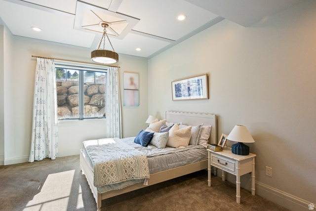 3 Carriagewood Cove, Unit 1088 Sandy, UT 84092 - Photo 57 of 79 Bedroom featuring a tray ceiling with a central pendant light fixture, recessed lighting, and neutral wall tones