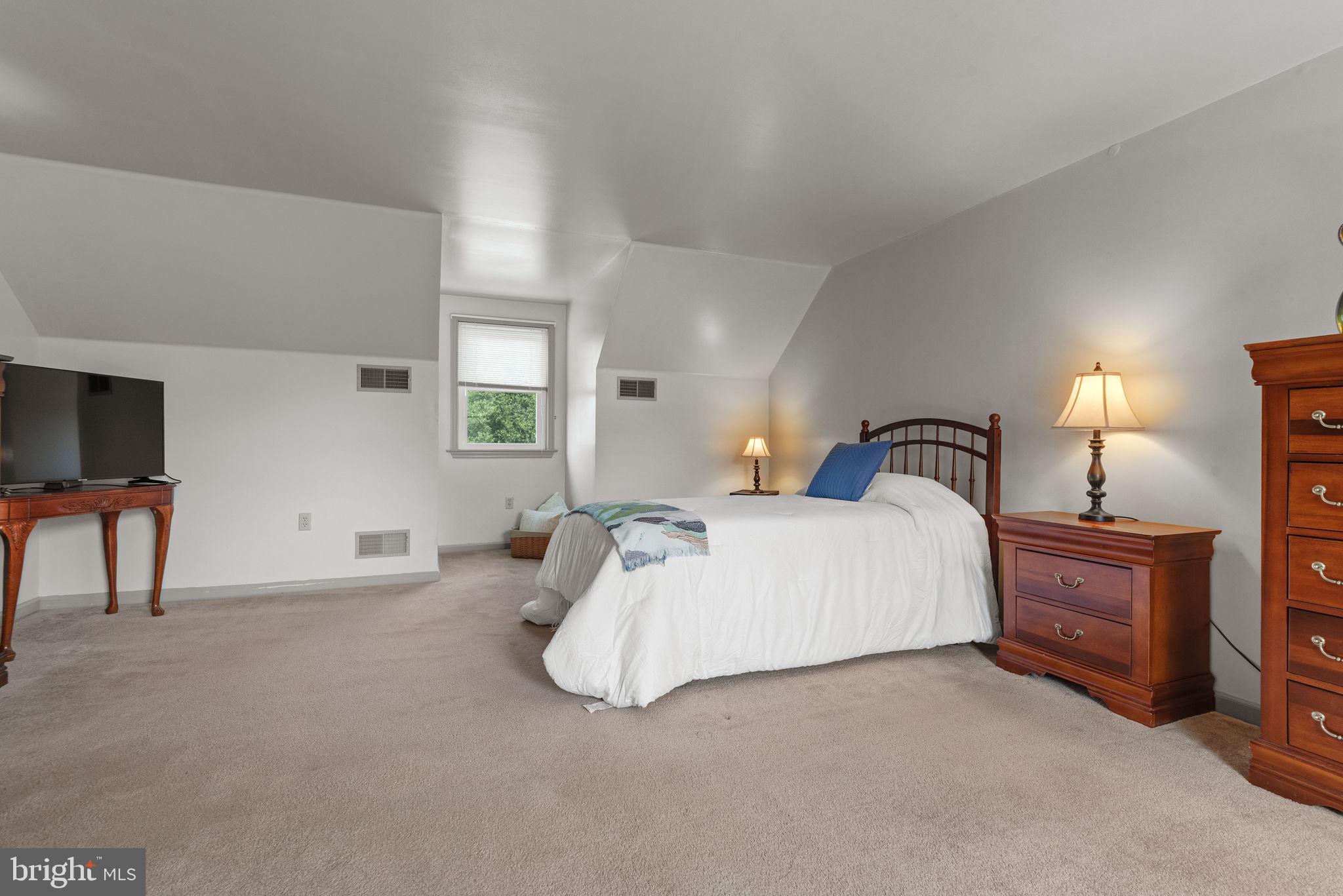 65 Winding Way Lititz, PA 17543 - Photo 14 of 28 a bedroom with bed and a night stand
