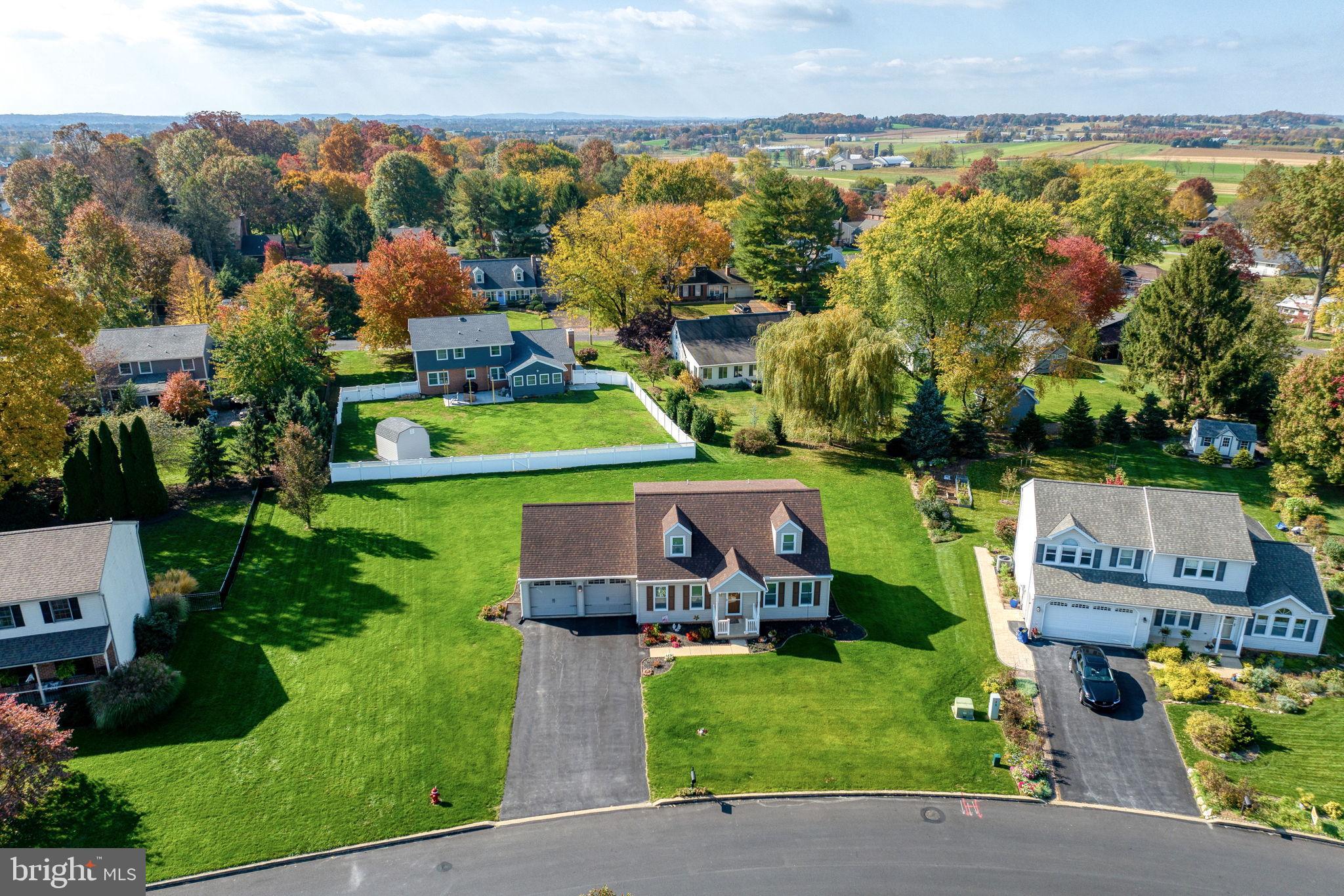 65 Winding Way Lititz, PA 17543 - Photo 27 of 28 an aerial view of a house with a garden and lake view