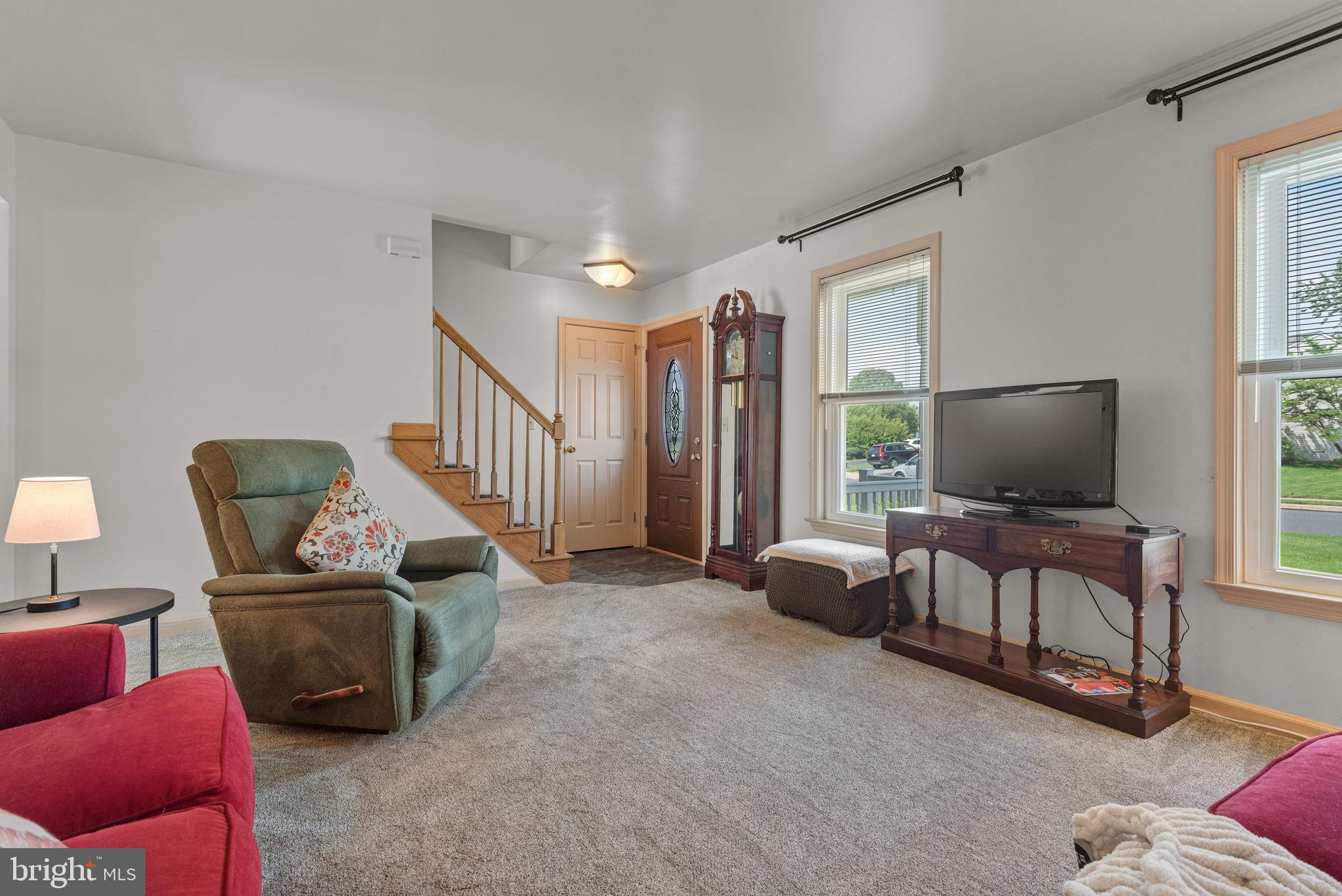 65 Winding Way Lititz, PA 17543 - Photo 3 of 28 a living room with furniture and a flat screen tv