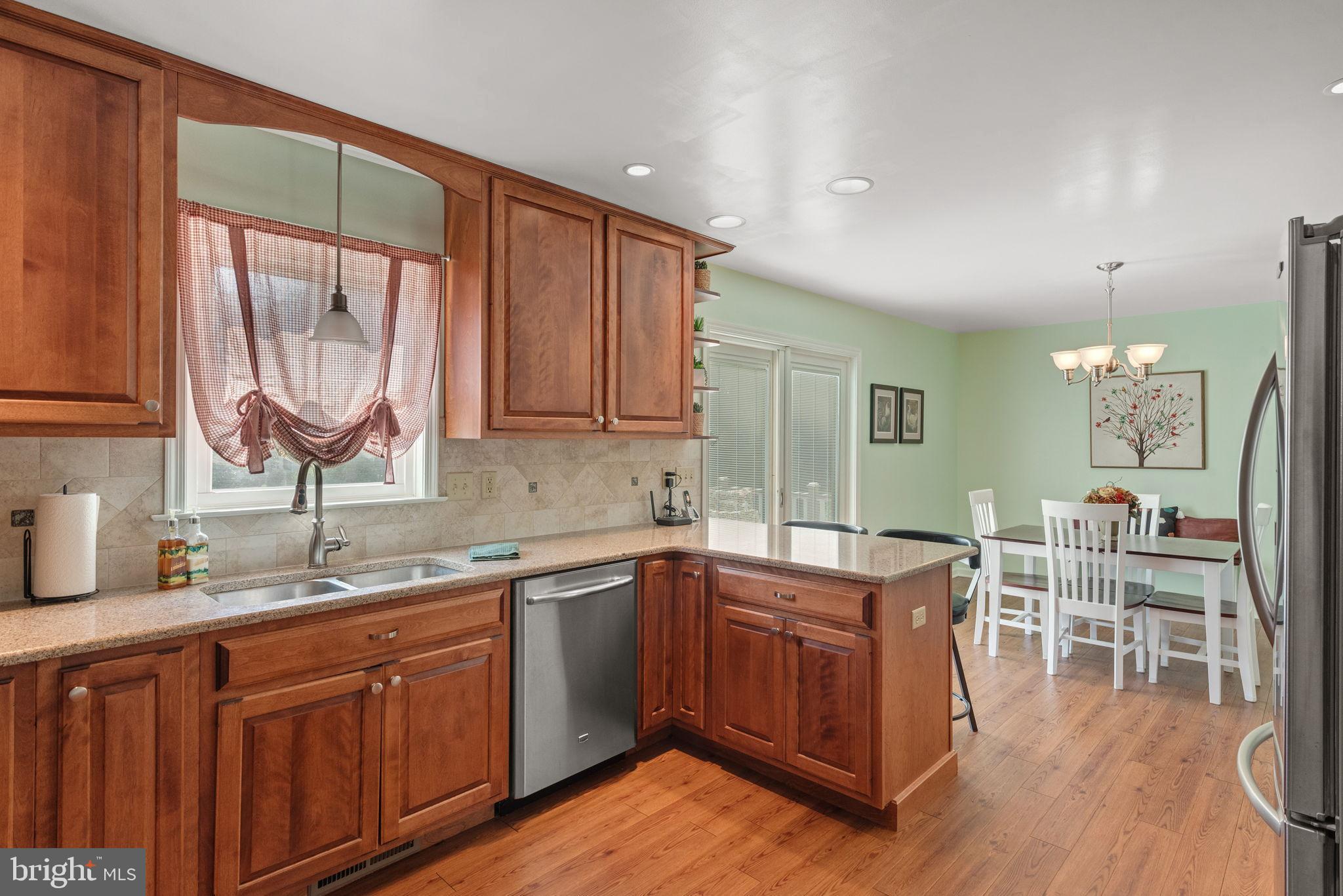 65 Winding Way Lititz, PA 17543 - Photo 6 of 28 a kitchen with a sink stove and cabinets