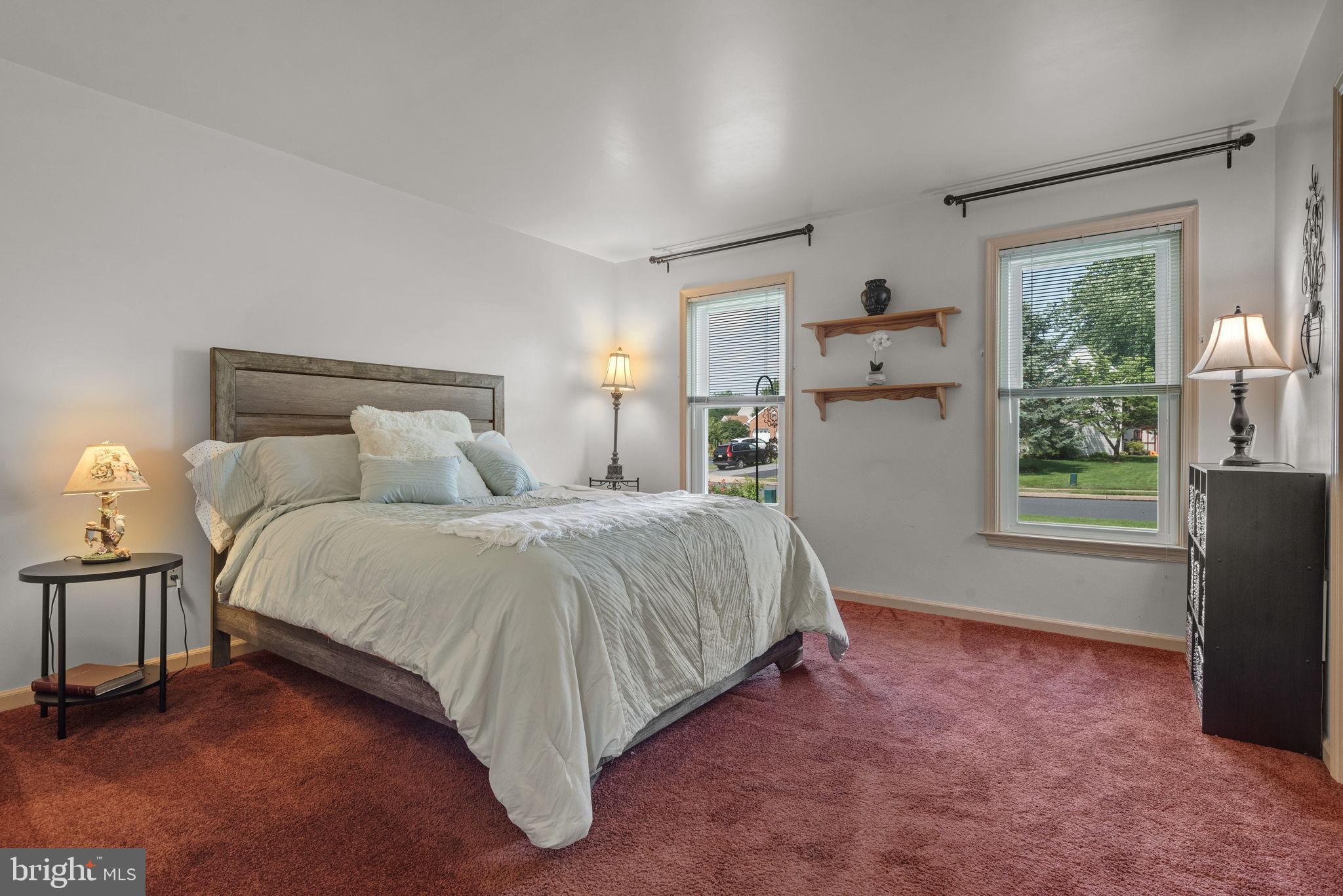 65 Winding Way Lititz, PA 17543 - Photo 9 of 28 a bedroom with a bed and a window