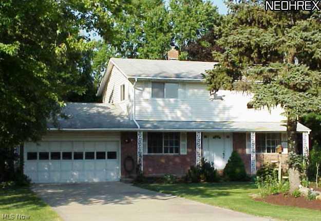 9037 Root Road North Ridgeville, OH 44039 - Photo 1 of 18 Country setting boasts of colonial with front porch and nestled on treed lot minutes to Rt 480/Turnpike and conveniences. City water and sewers are present.