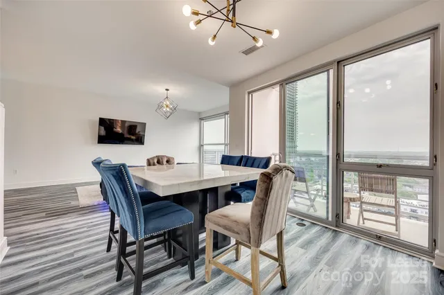 a city view from a balcony with city view