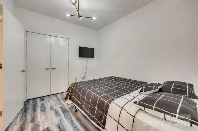 a bathroom with a sink toilet and vanity