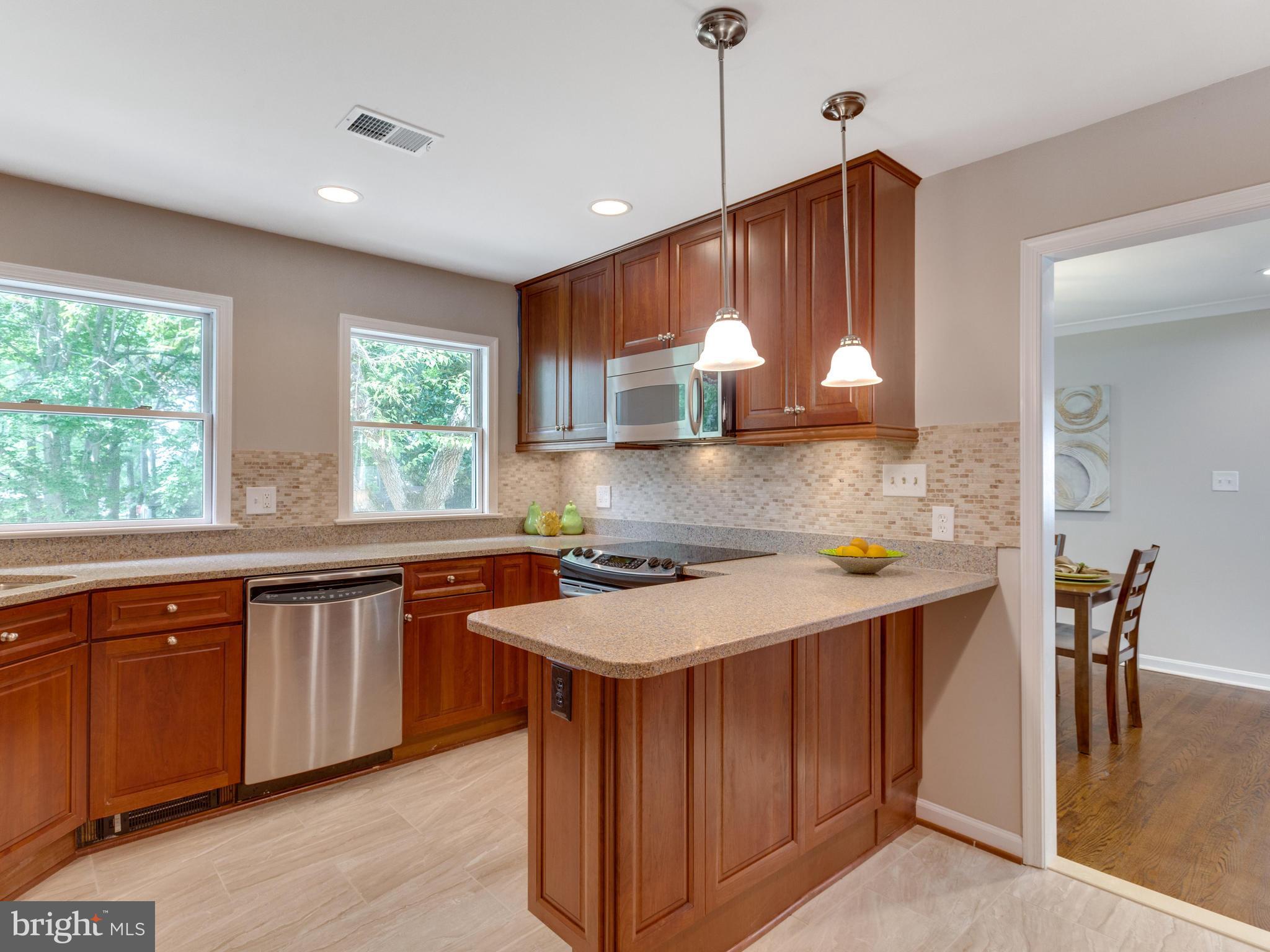 8532 Springman Street Alexandria, VA 22309 - Photo 9 of 30 Beautiful granite w/ complementary backsplash