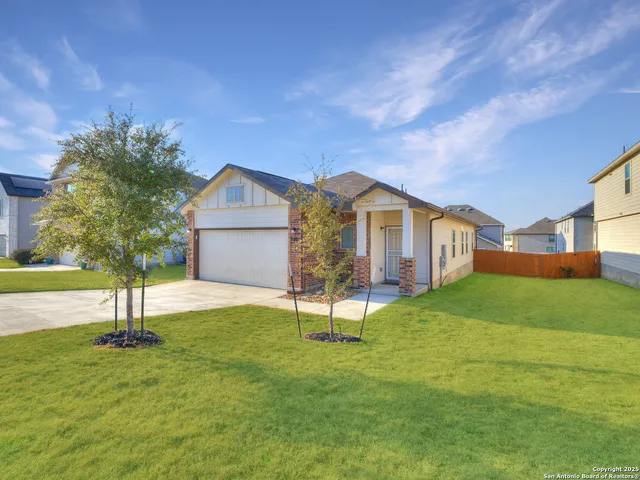 a house view with a garden space