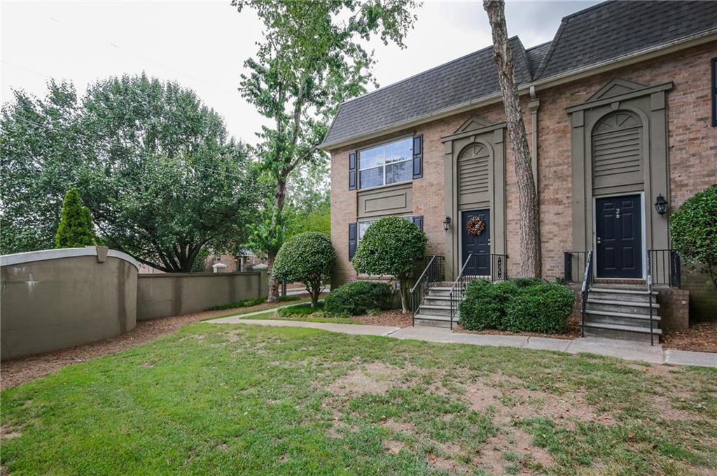 Gorgeous end unit in a quiet, gated community. Rare front yard! Check out that brand new roof, too. Totally move in ready. 