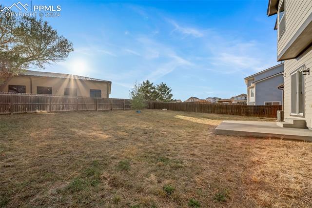 9356 Bethpage Road Peyton, CO 80831 - Photo 34 of 40 View of yard featuring a patio area