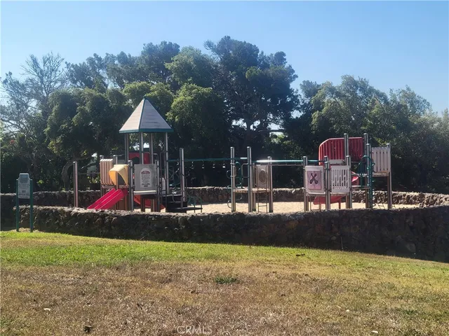 a outdoor space with swimming pool and trees