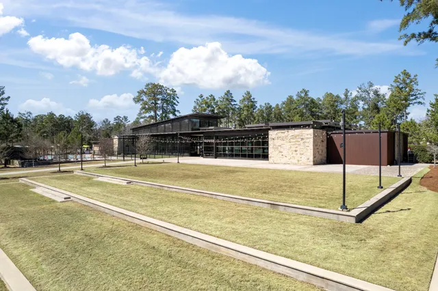 a view of a swimming pool with a lake view