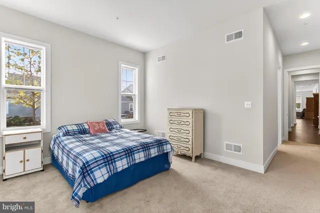 a sign on the side of a street