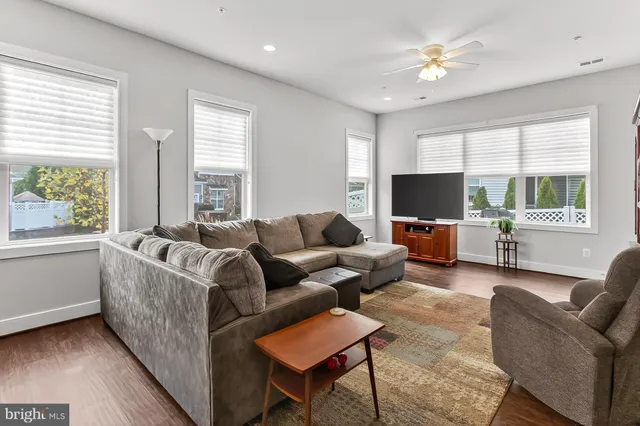 a view of kitchen with cabinets table and chairs