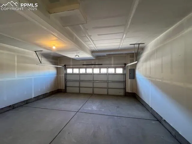 a view of an empty room with windows