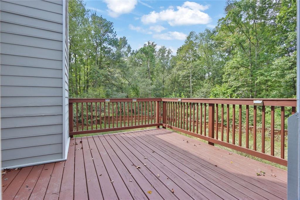 4645 Riveredge Cove Snellville, GA 30039 - Photo 39 of 43 a view of deck with wooden floor and fence