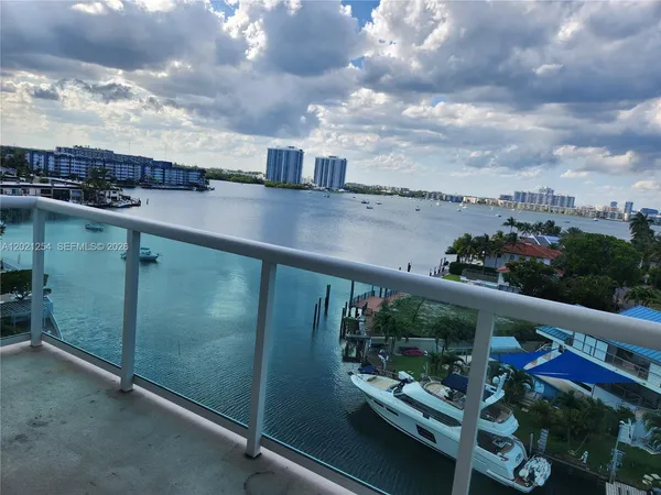 a view of swimming pool from a balcony