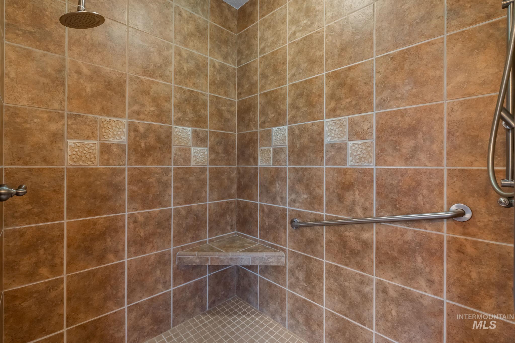 1579 North Watson Way Eagle, ID 83616 - Photo 15 of 30 Bathroom featuring a tile shower