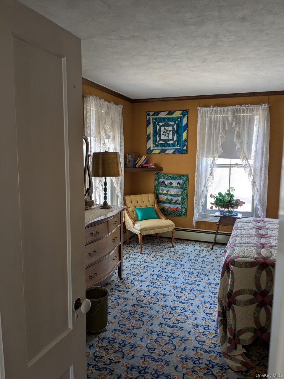 293 Carl Road Jewett, NY 12444 - Photo 23 of 49 a living room with furniture a rug and a window