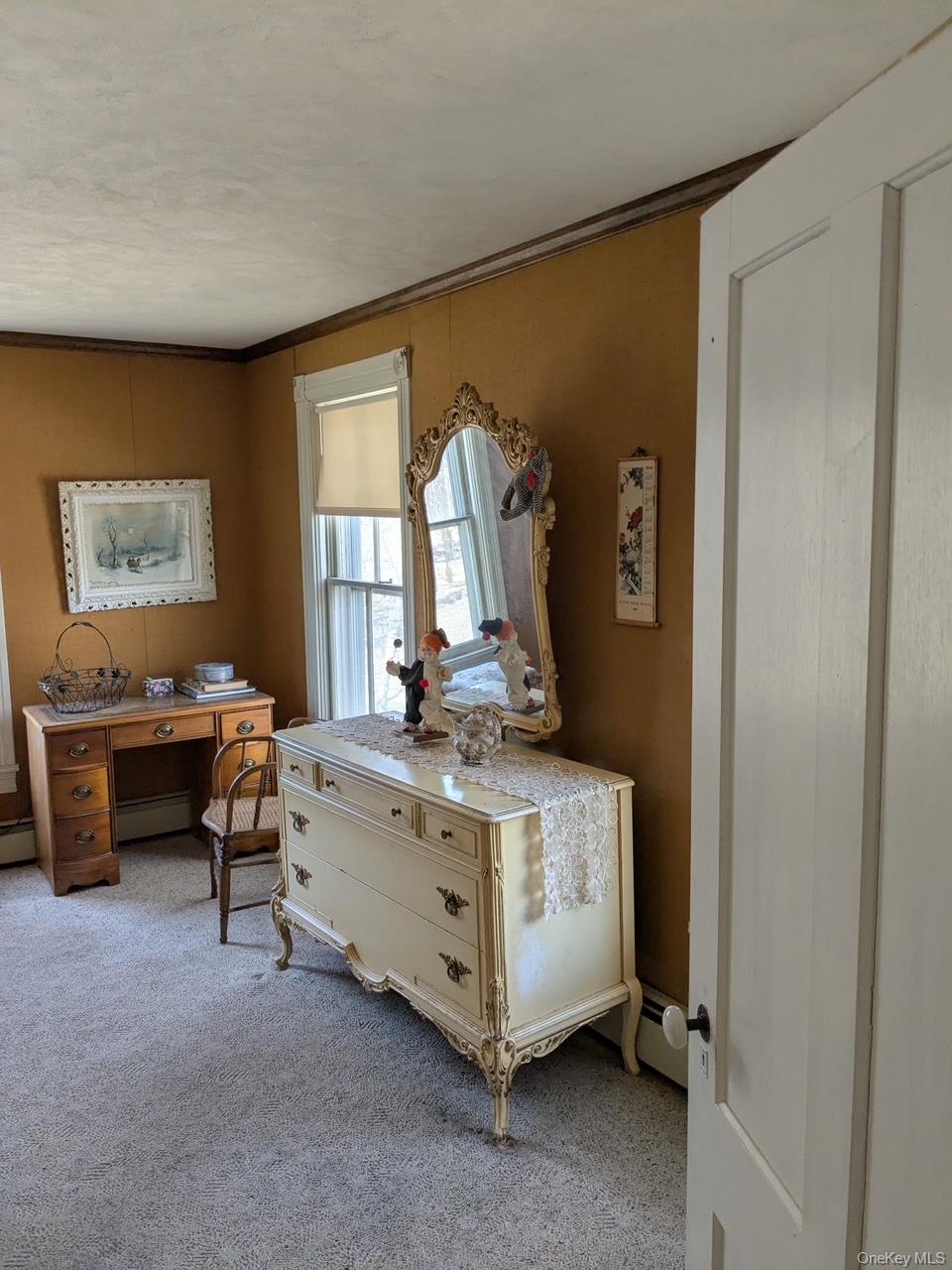 293 Carl Road Jewett, NY 12444 - Photo 32 of 49 a room with a bed and a table