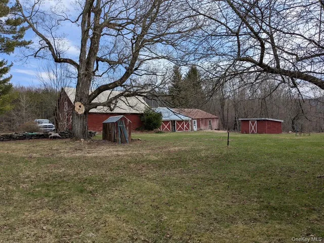 a fire hydrant in the middle of a field