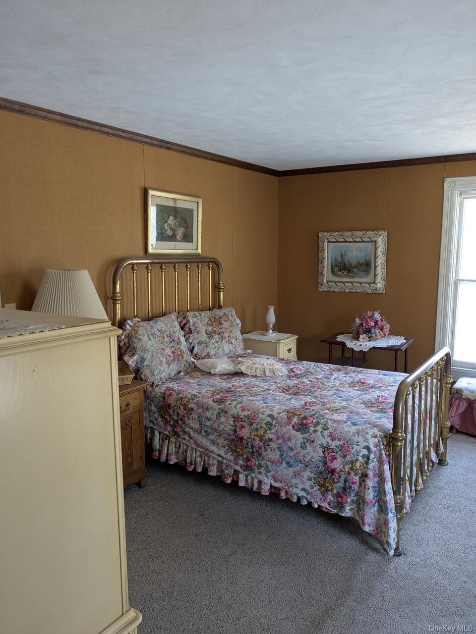 293 Carl Road Jewett, NY 12444 - Photo 39 of 49 a bedroom with a bed and a window