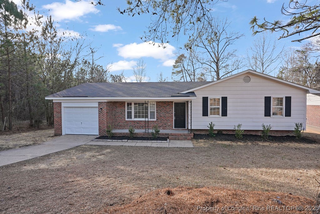 5314 Hornbeam Road Fayetteville, NC 28304 - Photo 15 of 15 a front view of a house with a yard