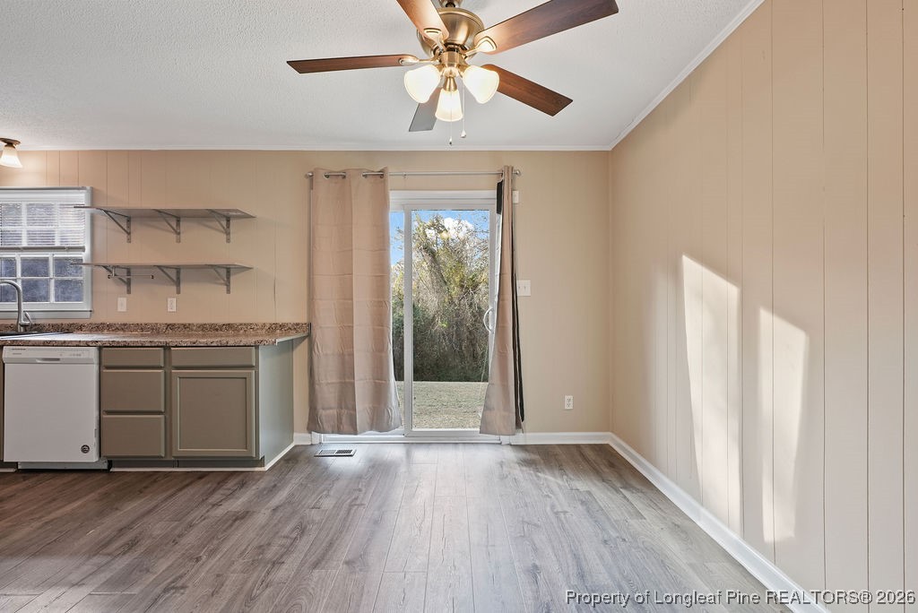 5314 Hornbeam Road Fayetteville, NC 28304 - Photo 4 of 15 a kitchen with a sink cabinets stainless steel appliances and a window