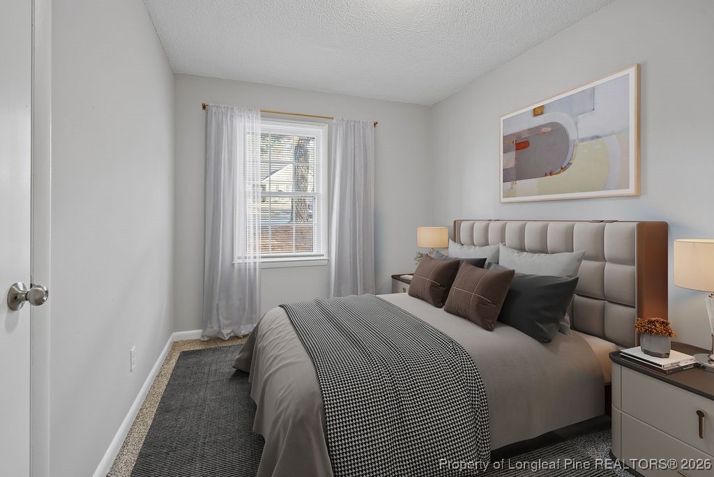 5314 Hornbeam Road Fayetteville, NC 28304 - Photo 9 of 15 a bedroom with bed and window