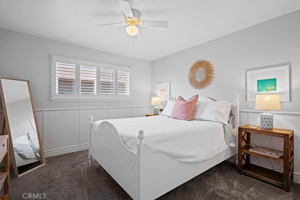 57 17th Street Cayucos, CA 93430 - Photo 19 of 24 a bedroom with a bed and a window