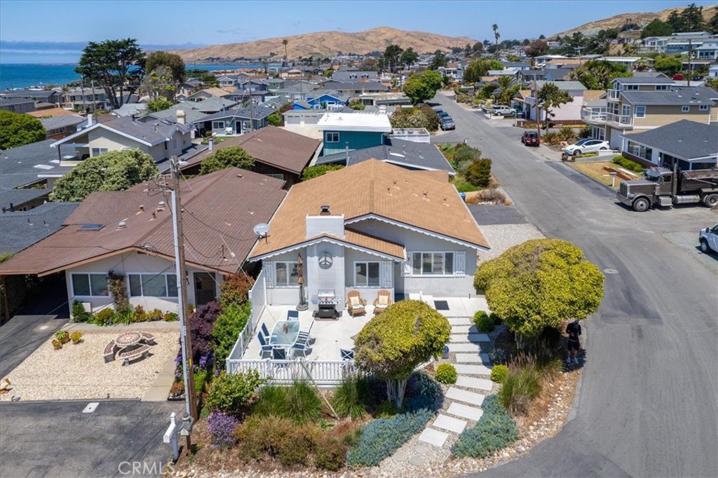 57 17th Street Cayucos, CA 93430 - Photo 4 of 24 an aerial view of a house with garden space and street view