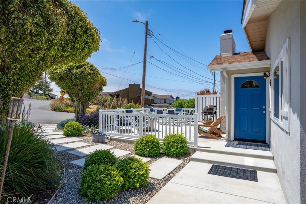 57 17th Street Cayucos, CA 93430 - Photo 8 of 24 a view of a chair and table in the patio