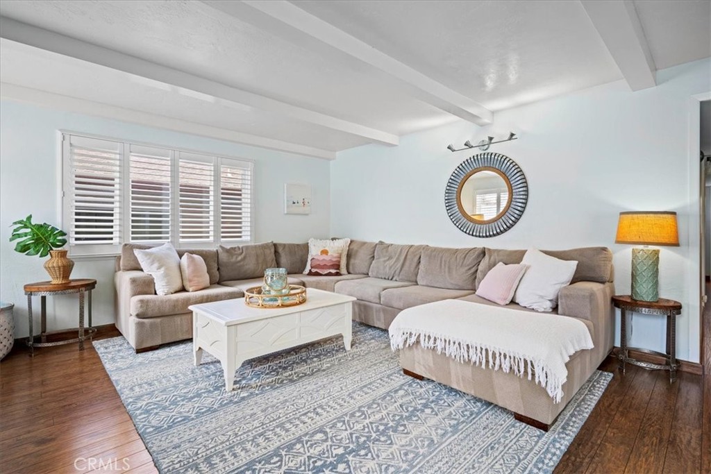 57 17th Street Cayucos, CA 93430 - Photo 9 of 24 a living room with furniture and a large window